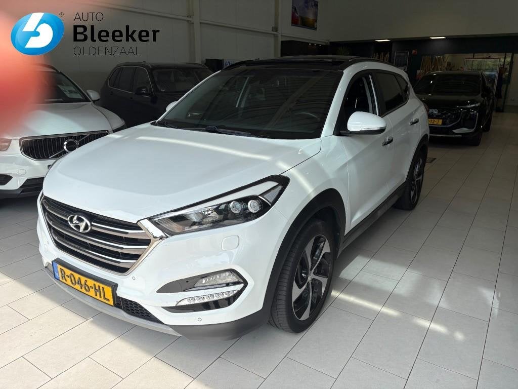 Hyundai TUCSON 1.6 T-GDI 177PK Premium 4WD Ecc Cruise Navi P, Auto's, Hyundai, 13 km/l, Gebruikt, 4 cilinders, Met garantie (alle)