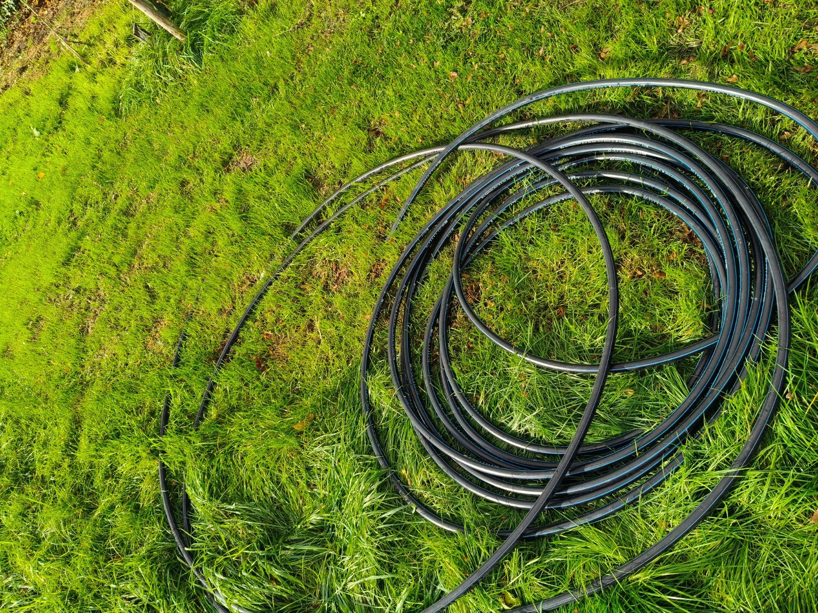 25 meter tyleenslang HDPE 10BAR 25 X 2.7 SDR9 50, Tuin en Terras, Ophalen, Gebruikt, Tuinslang