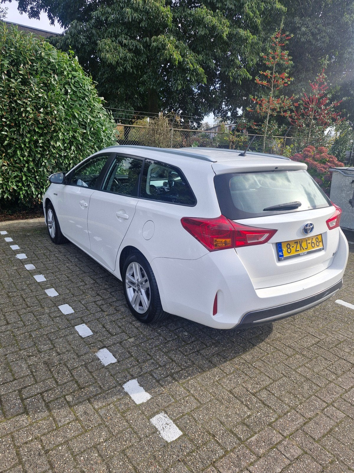 Toyota Auris 1.8 Hybrid Touring Sports CVT 2015 Wit, Auto's, Dealer onderhouden, Zwart, 345 kg, Adaptive Cruise Control