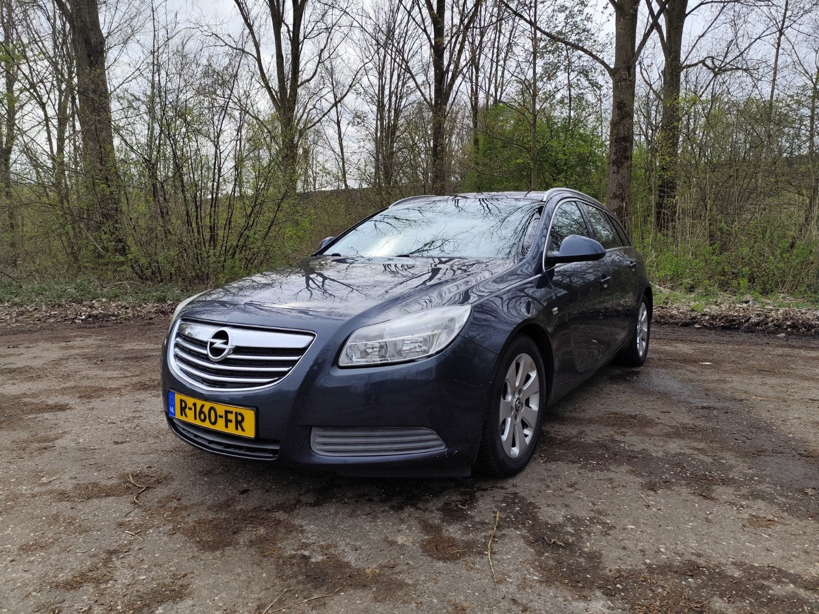 Opel Insignia Sports Tourer 124.279 km Airco/Climate/Cruise, Auto's, Voorwielaandrijving, Zwart, Blauw, Stationwagon