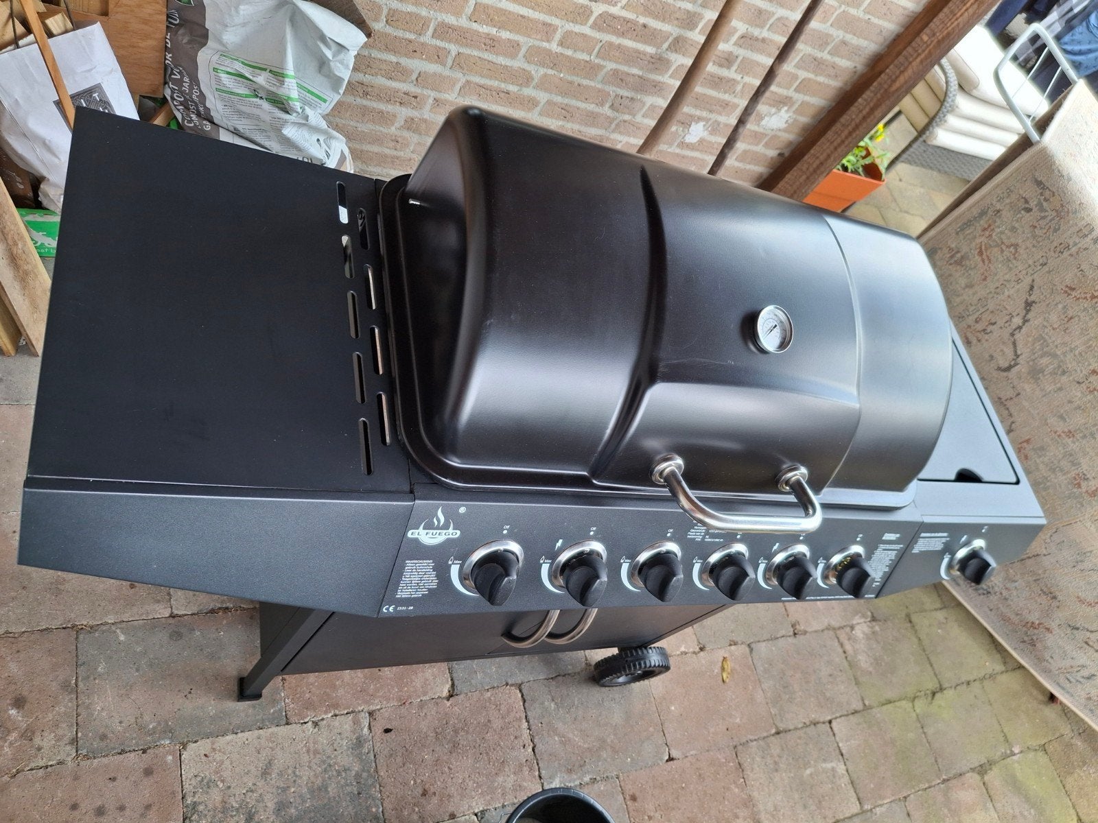 Gasbarbecue met 6 branders en extra zijbrander, Tuin en Terras, Houtskoolbarbecues, Ophalen, Zo goed als nieuw, El Fuego