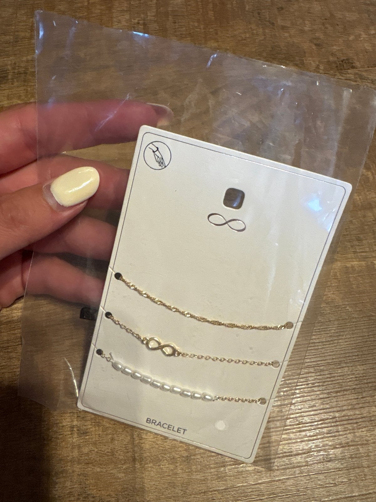 Set van 3 gouden armbandjes met parels en infinity teken, Overige materialen, Nieuw, Ophalen of Verzenden, Met bedels of kralen