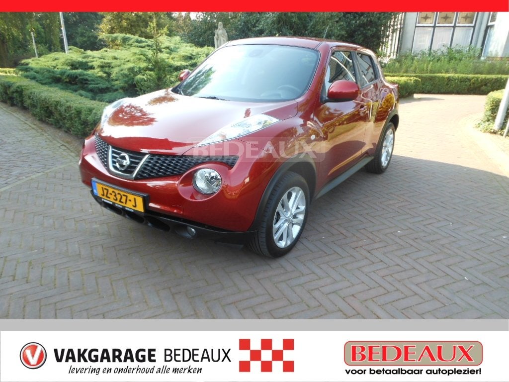 NISSAN Juke 1.6 117pk Tekna bij Vakgarage met 12 maanden B, Auto's, Nissan, Voorwielaandrijving, 12 maanden, Stof, Zwart