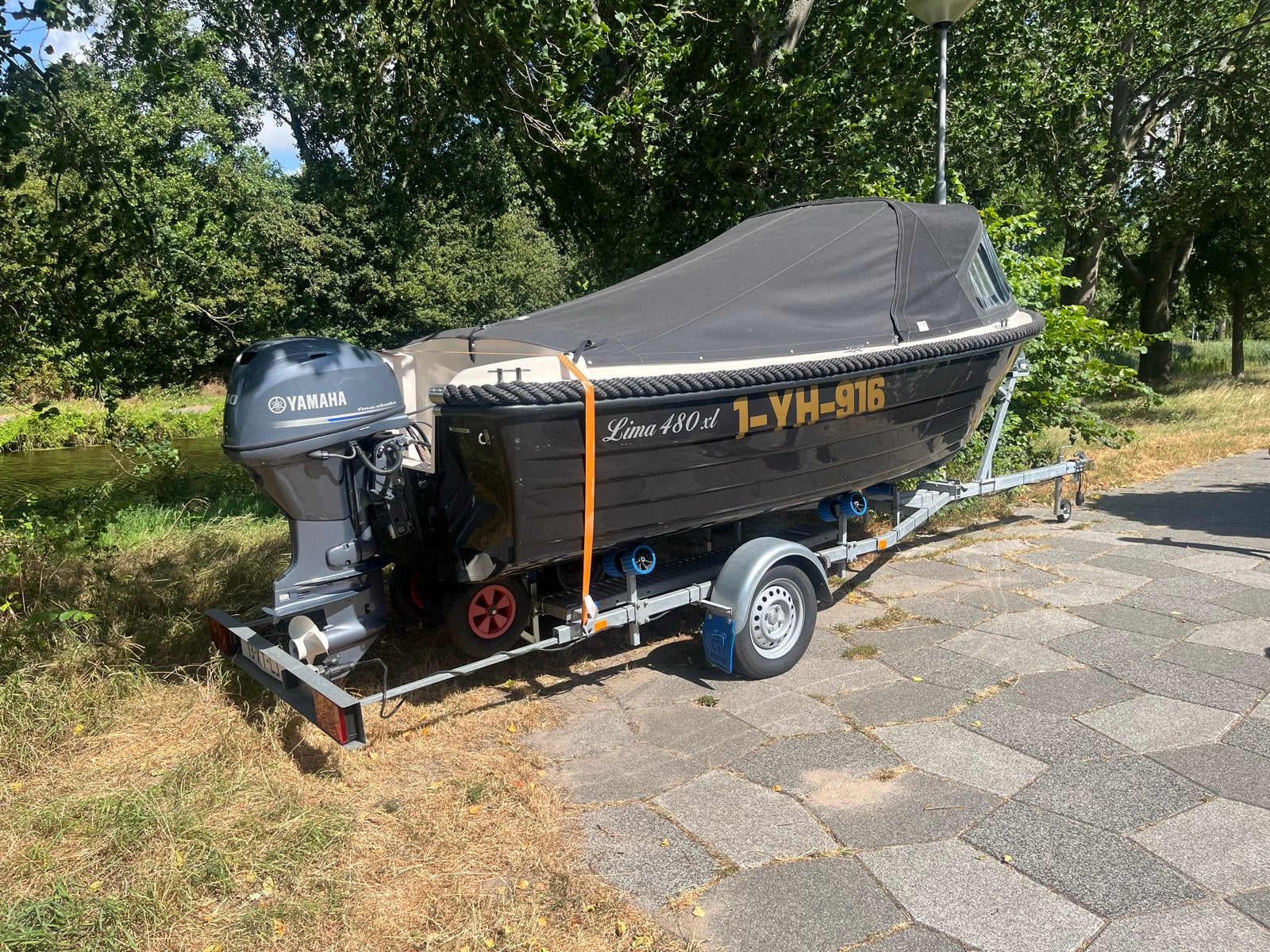 Boot 40pk met trailer, vesten en riggers, Benzine, Gebruikt, Afdekzeil, Buitenboordmotor