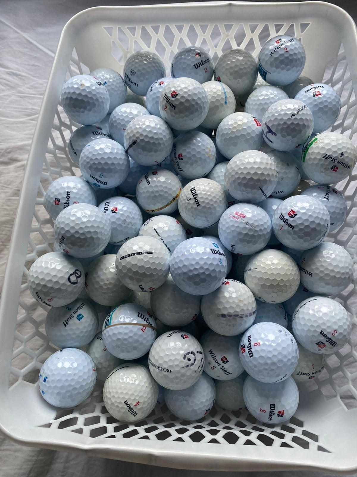100 Wilson staff duo/dx2 soft golfballen goede kwaliteit, Ophalen of Verzenden, Zo goed als nieuw, Bal(len)