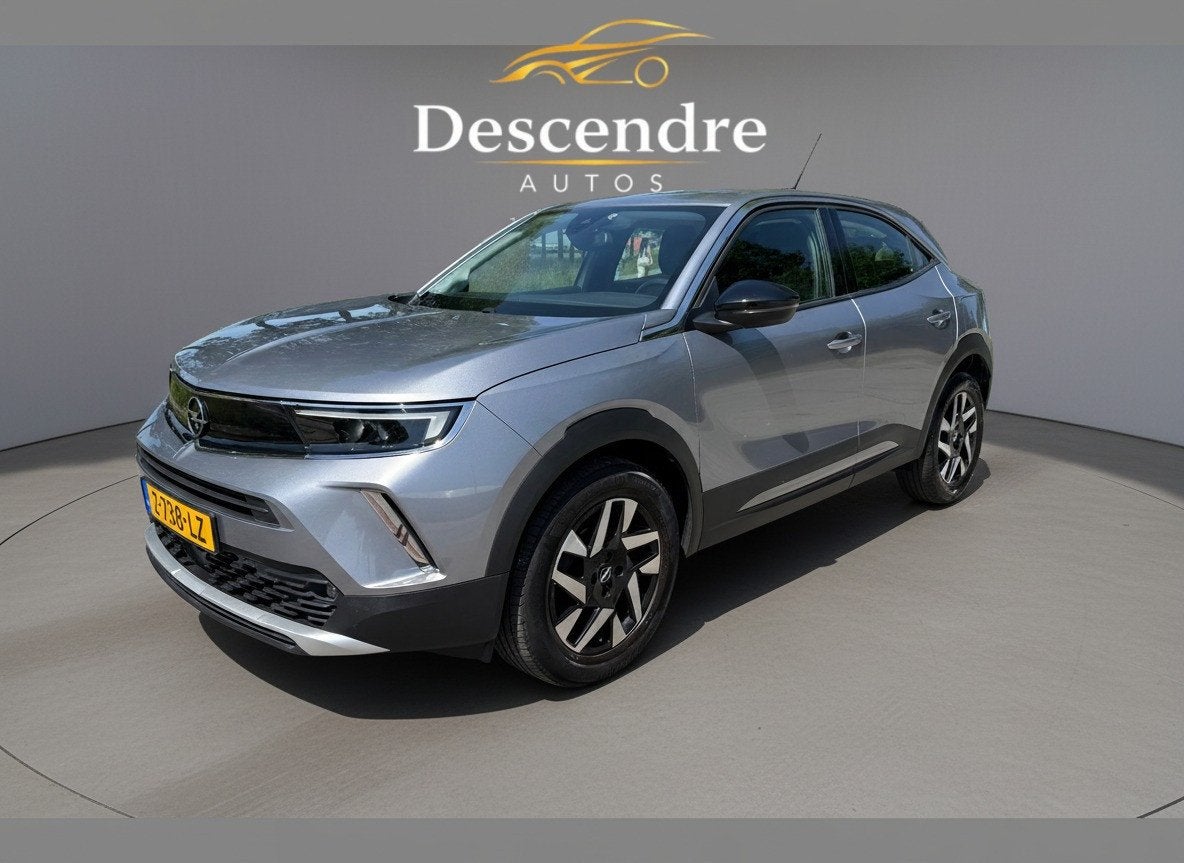 Opel Mokka 1.2 Turbo Elegance 12 maand garantie (bj 2021), Auto's, Gebruikt, 1199 cc, Met garantie (alle), 3 cilinders