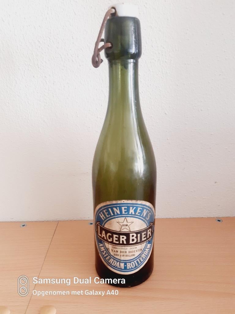 Mooie Heineken.s lager bier fles Amsterdam Rotterdam, Ophalen of Verzenden, Zo goed als nieuw, Glas of Glazen, Heineken