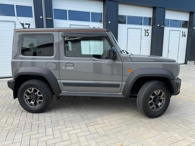 Suzuki Jimny 1.5 Carplay | 4X4 | Airco | LED | Jaar Garantie, Auto's, Suzuki, Stof, Lane Keeping Assist, 4 cilinders, 102 pk