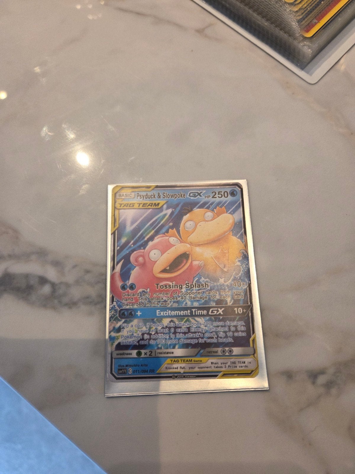 Pokémon Kaart: Psyduck & Slowpoke GX TAG TEAM (Full Art), Ophalen of Verzenden, Zo goed als nieuw