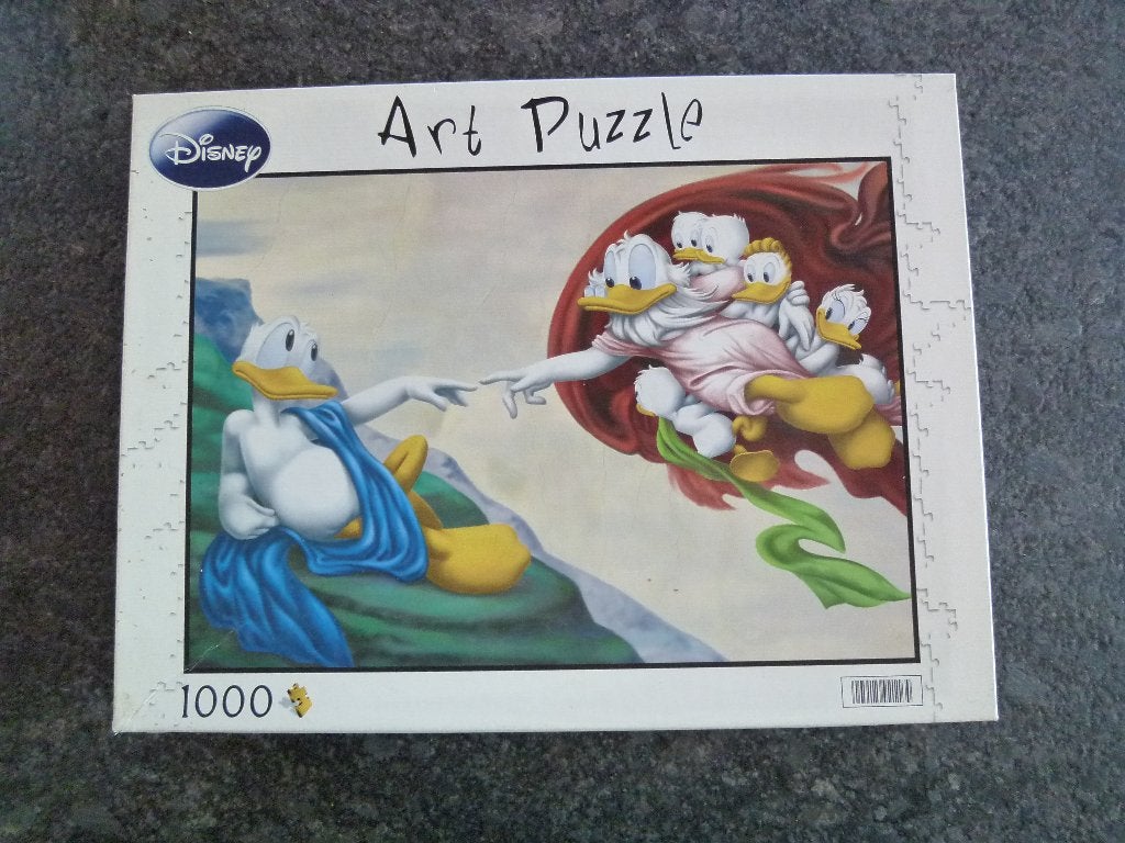 Disney art puzzel The creation of Donald 1000 stukjes, Ophalen of Verzenden, 500 t/m 1500 stukjes, Zo goed als nieuw