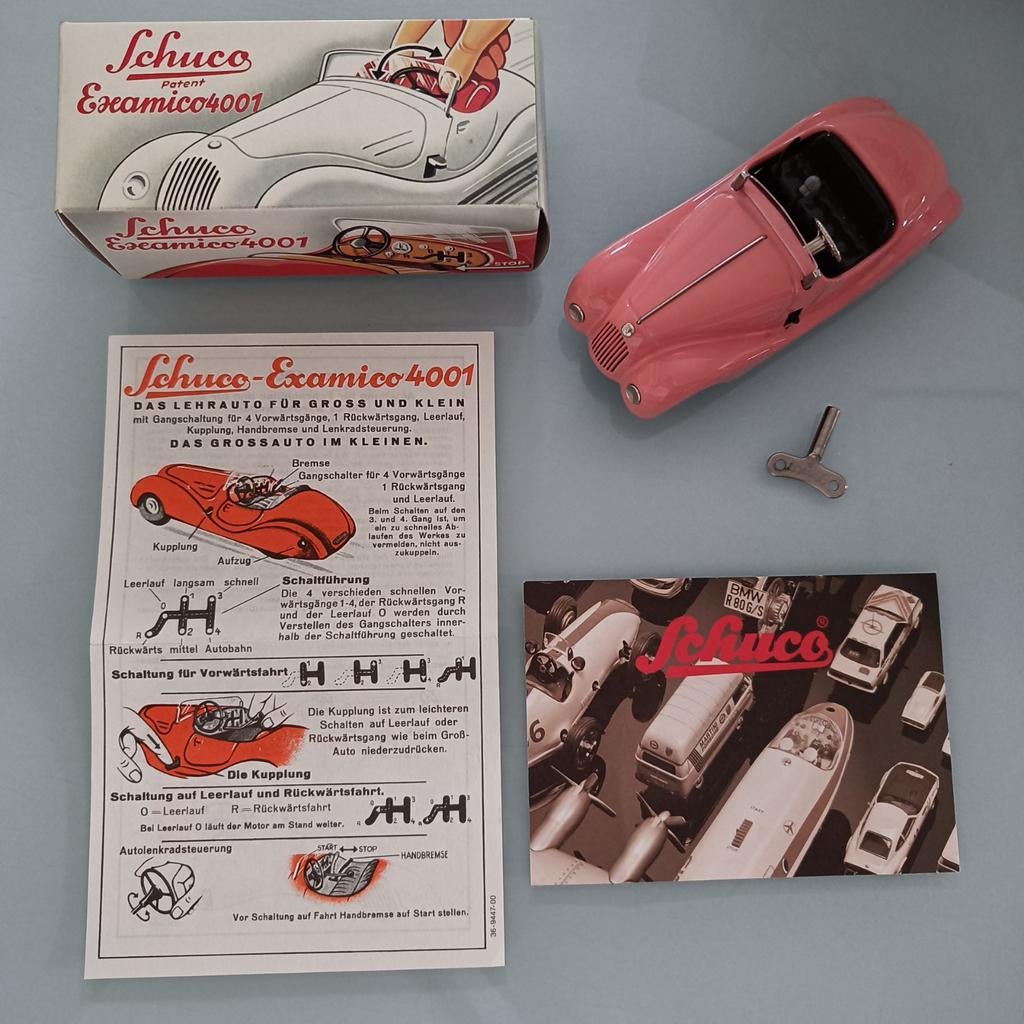 Schuco Examico 4001 roze modelauto reproductie., Antiek en Kunst, Antiek | Speelgoed, Ophalen of Verzenden