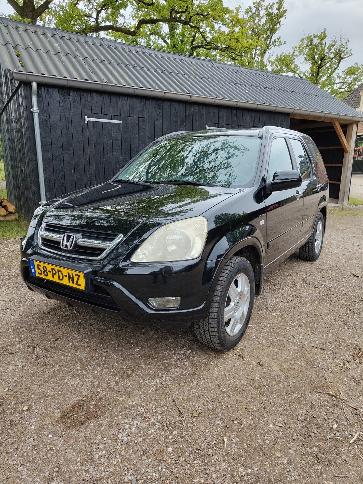 Honda CR-V 2.0 I AUT 2004 Zwart, Auto's, Honda, Automaat, 1998 cc, 1458 kg, Zwart