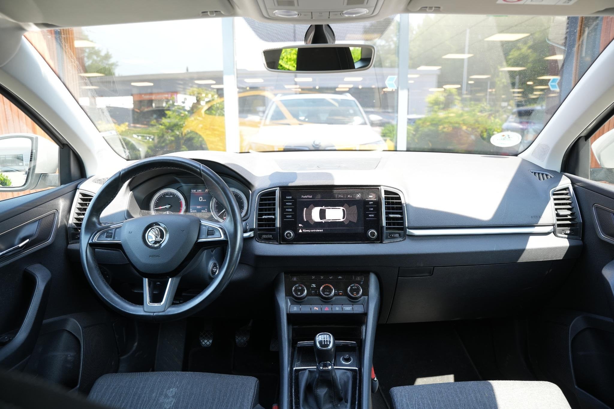 Skoda Karoq 1.0 TSI Business Edition, Auto's, Voorwielaandrijving, Stof, Gebruikt, 116 pk