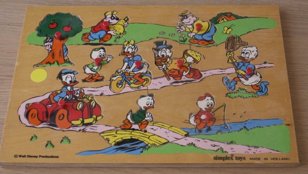 Vintage houten insteekpuzzel Donald Duck knoppen WaltDisney, Ophalen of Verzenden, Meer dan 50 stukjes, Zo goed als nieuw
