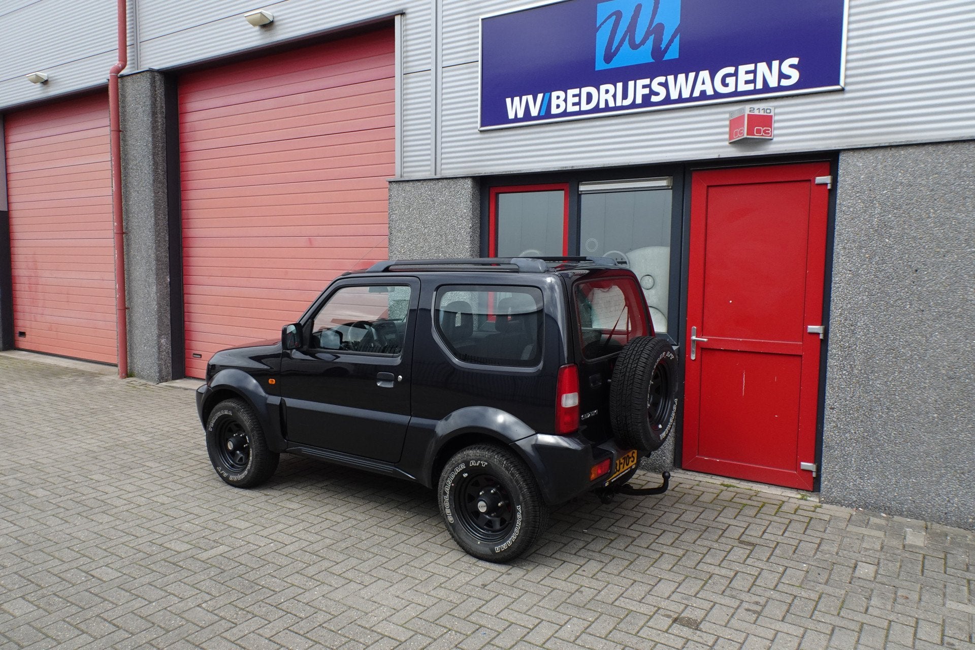 Suzuki Jimny 1.3 JX 4 x 4 127009 km (bj 2009), Auto's, Gebruikt, Zwart, 4 stoelen, Zwart