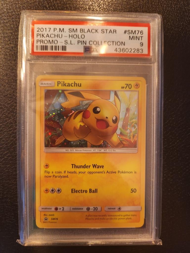 Pikachu SM76 Promo PSA 9 - Holo Black Star, Ophalen of Verzenden, Zo goed als nieuw, Losse kaart, Foil