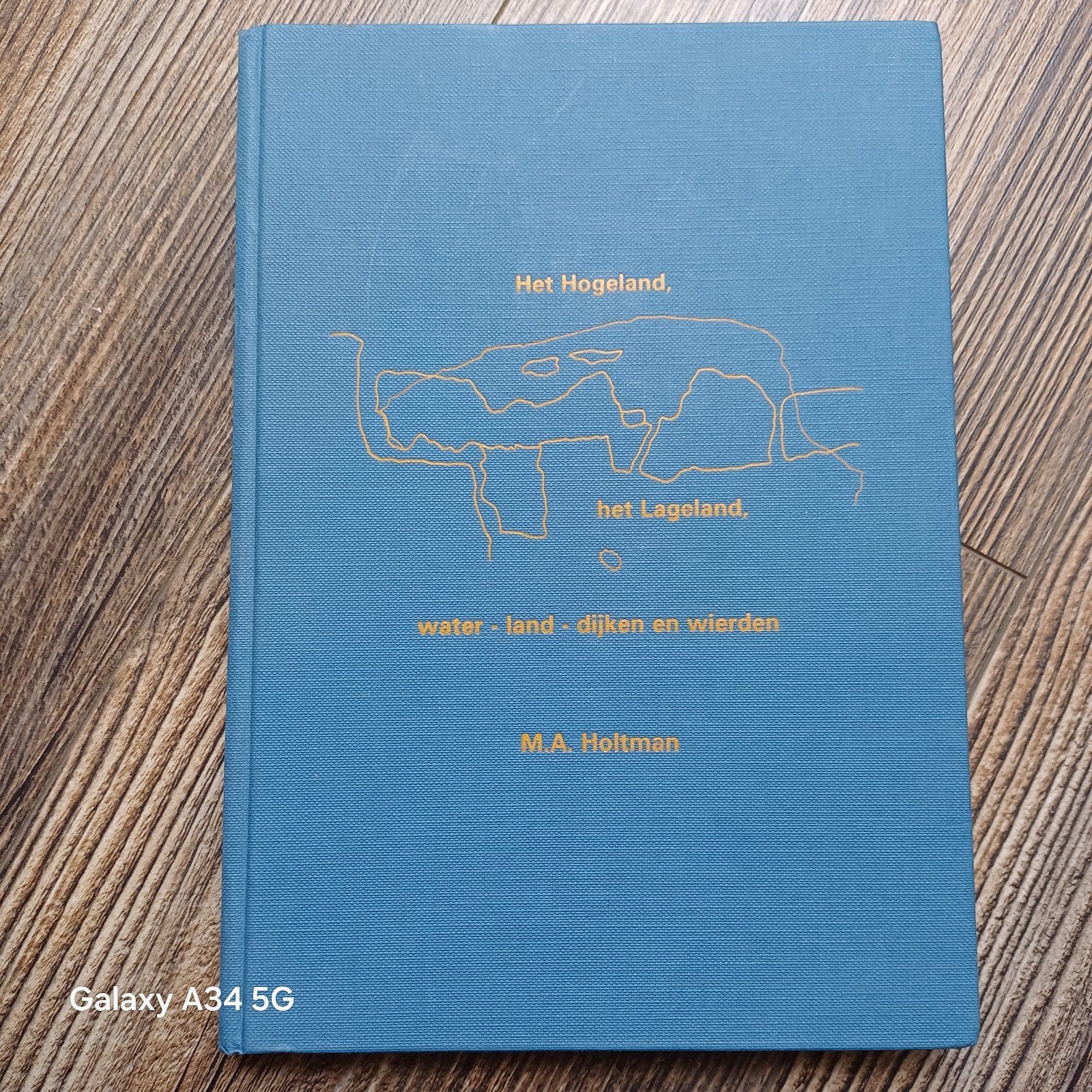 Het Hogeland, het Lageland: water, land, dijken en wierden, Boeken, Ophalen of Verzenden, Zo goed als nieuw, M.A. Holtman, Nederland