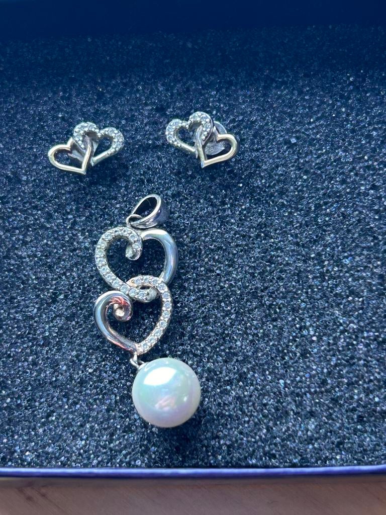 Lucardi sieradenset hartjes zilver en rose goud, Ophalen of Verzenden, Zo goed als nieuw, Knopjes of Stekers, Zilver