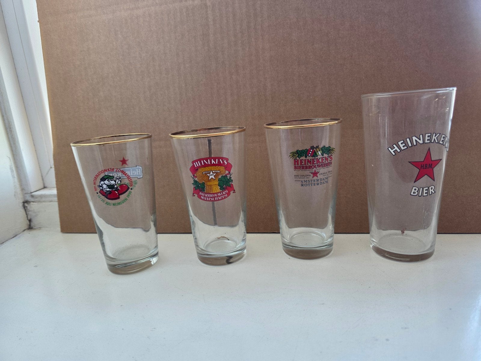 Doos met Heineken glazen, Ophalen of Verzenden