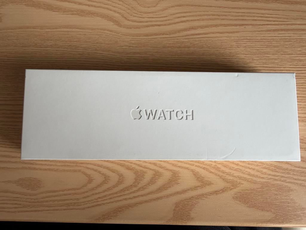 NIEUW Apple Watch 10 46mm Titanium Gold met 2 jaar garantie, Ophalen of Verzenden, Nieuw, Zwart, IOS