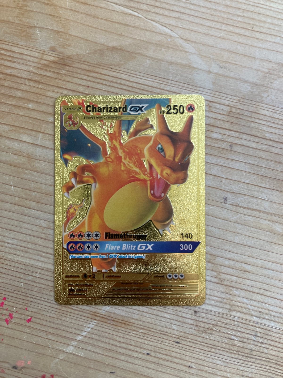 Gouden Charizard GX Pokémon Kaart - Zo goed als nieuw, Ophalen of Verzenden, Zo goed als nieuw, Losse kaart, Foil