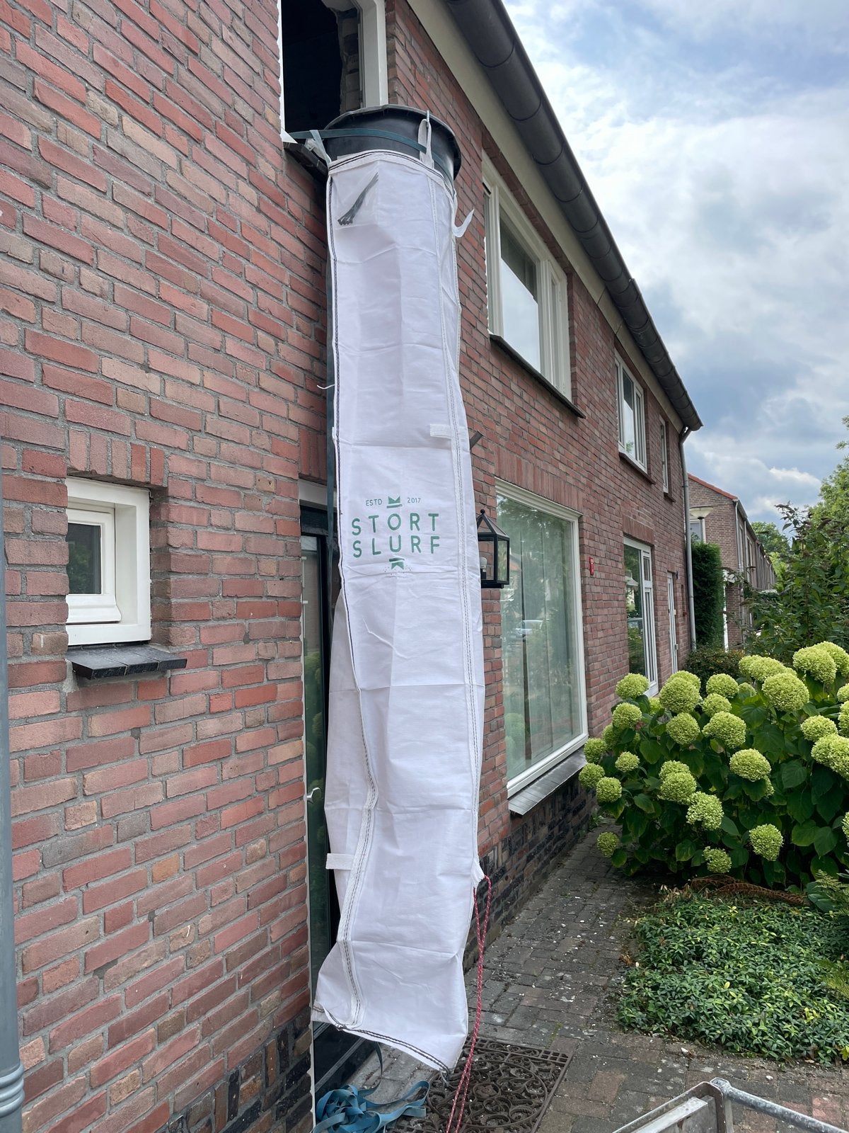 Stortslurf voor bouwafval, Ophalen, Zo goed als nieuw