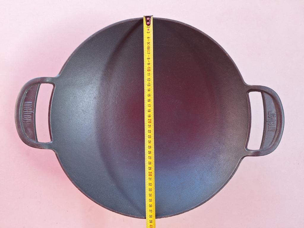 Weber Gietijzeren Wokpan, Ophalen