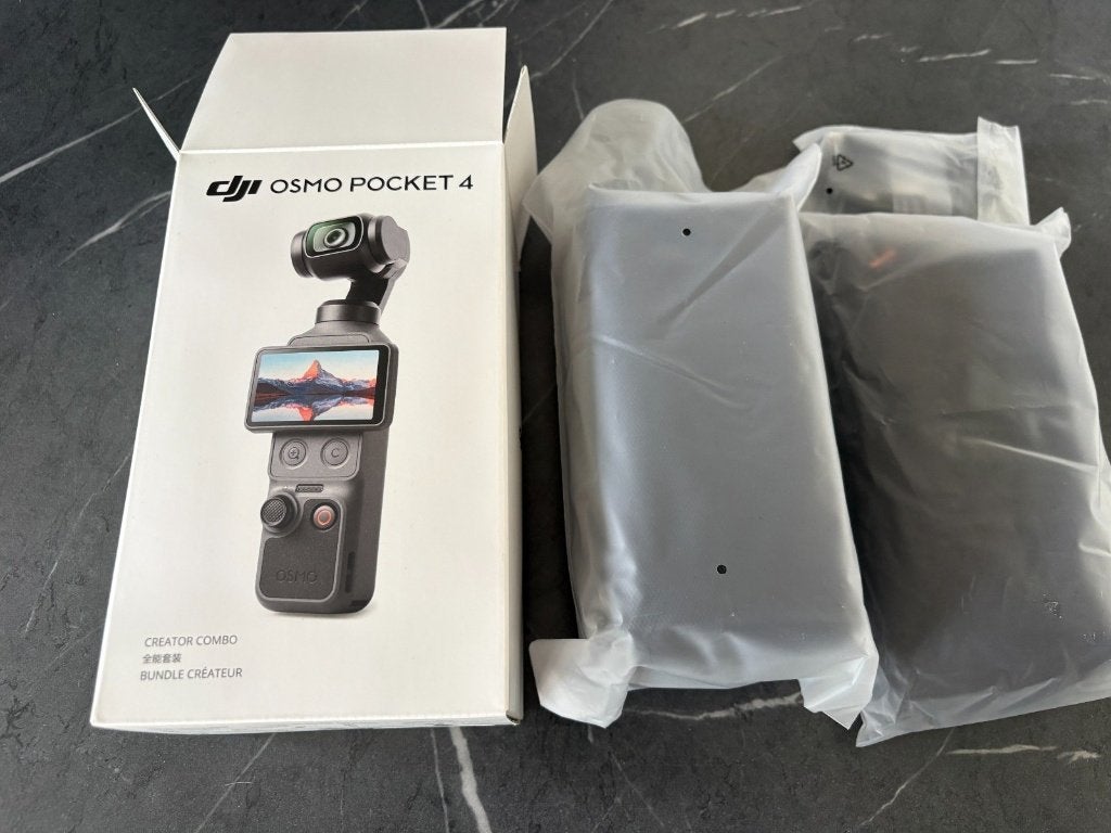 DJI Osmo Pocket 4 Creator Combo-bundel, Ophalen of Verzenden, Zo goed als nieuw, Overige merken