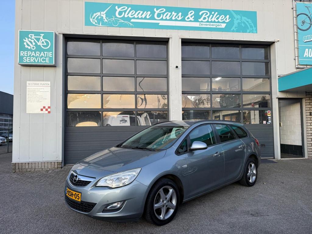 Opel Astra Sports Tourer 1.4 Turbo Cosmo (bj 2012), Auto's, Euro 5, Gebruikt, 4 cilinders, 1337 kg