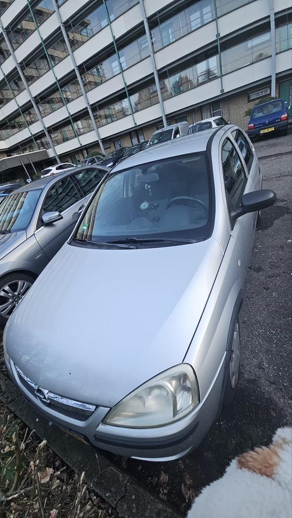 Opel Corsa 1.2 16V Twinport 5D 2004 Grijs, Auto's, Voorwielaandrijving, 4 cilinders, 1229 cc, Origineel Nederlands