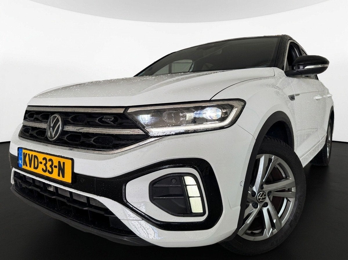 Volkswagen T-Roc TSI 110PK R-LINE BUSINESS CAMERA/MASSAGE/IQ, Auto's, Gebruikt, Automatische klimaatregeling, Leder en Stof, Wit