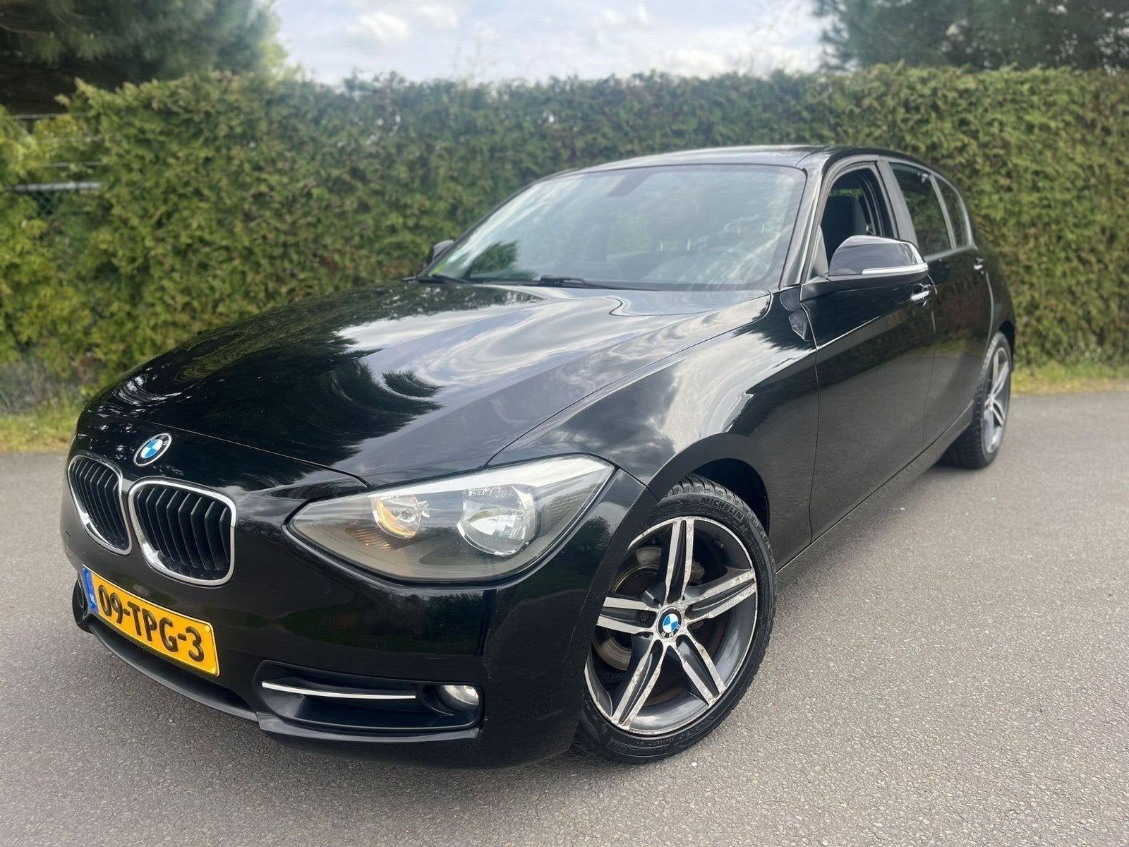 BMW 1-Serie 116I sport 100KW 5DR 2012 Zwart, Auto's, BMW, 1-Serie, 4 cilinders, Zwart, Origineel Nederlands