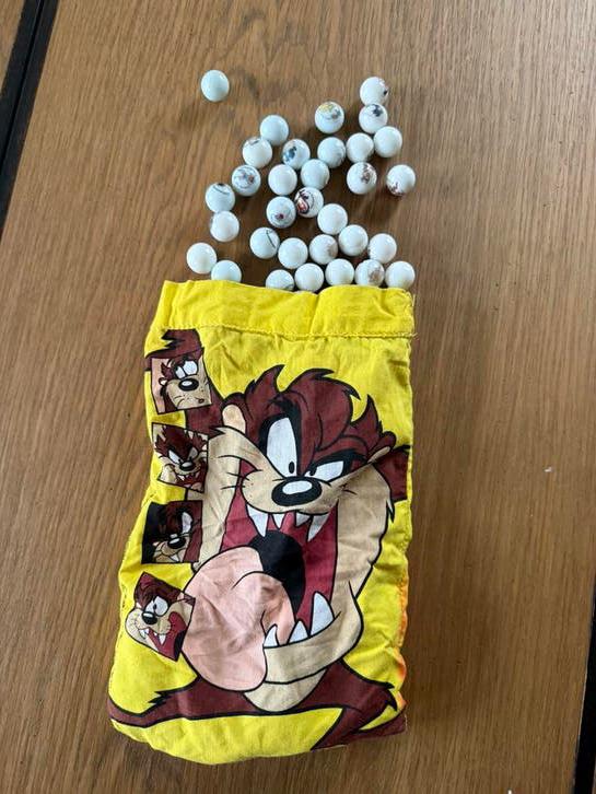 Looney Tunes zakje knikkers 1999, Ophalen of Verzenden, Looney Tunes, Gebruikt, Overige typen