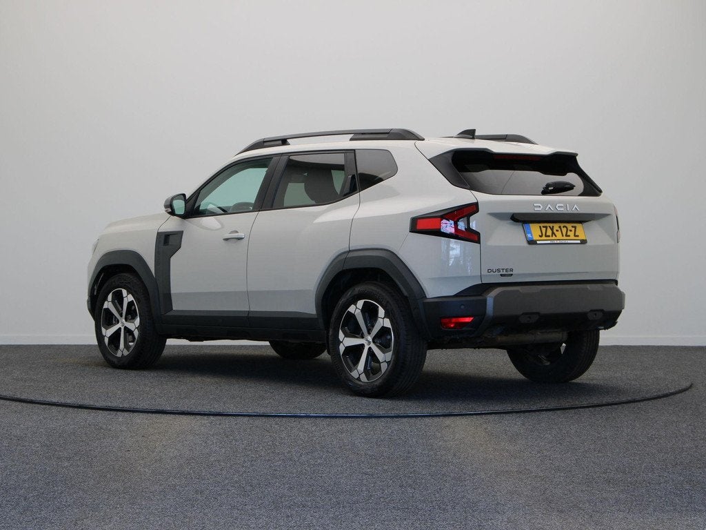 Dacia Duster 1.6 Hybrid 140 Journey | Lichtmetalen velgen |, Auto's, Dacia, Stof, Gebruikt, 4 cilinders, Duster