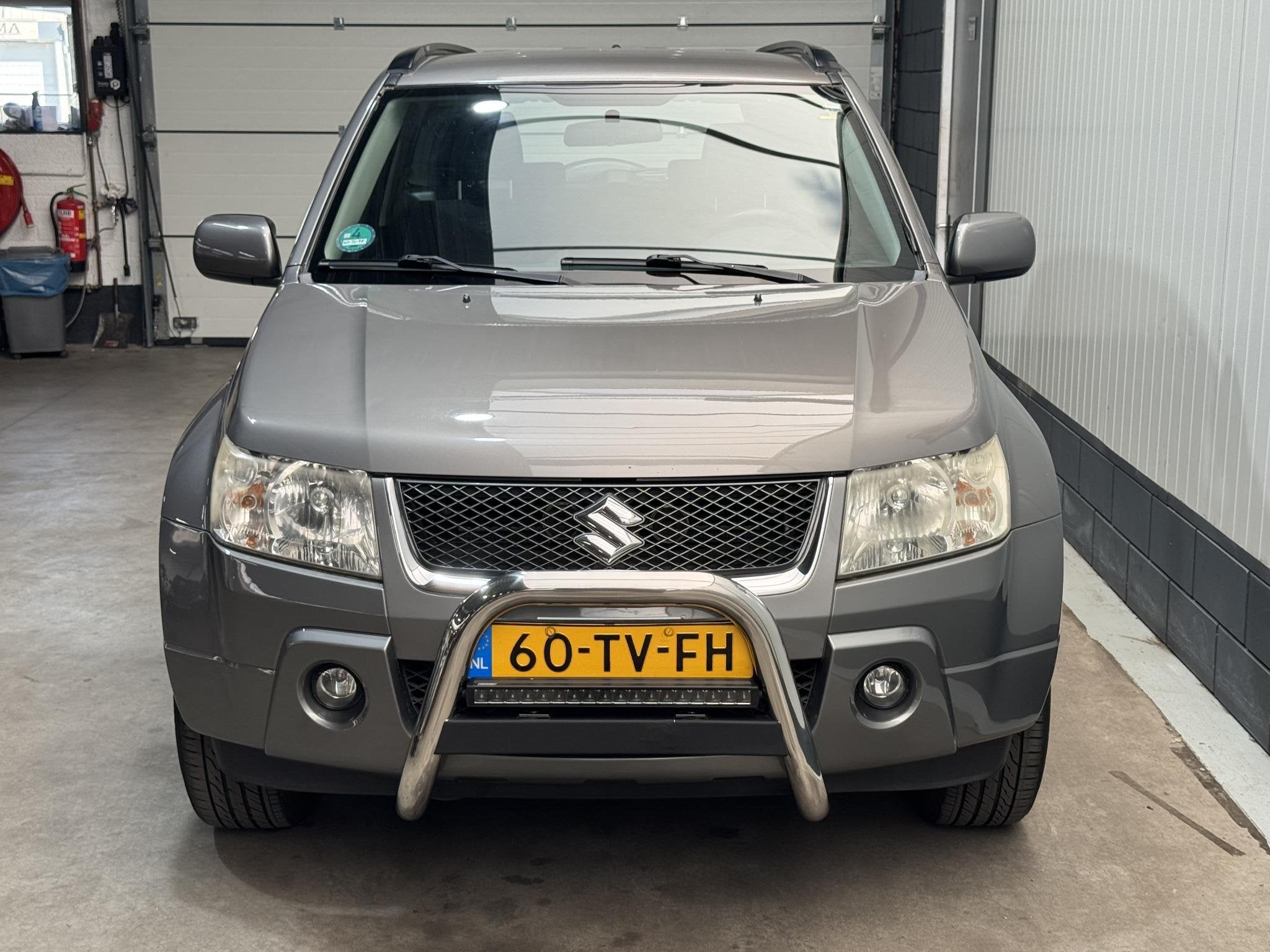 Suzuki Grand Vitara 1.6-16V Exclusive, Auto's, 1345 kg, Stof, Gebruikt, 4 cilinders