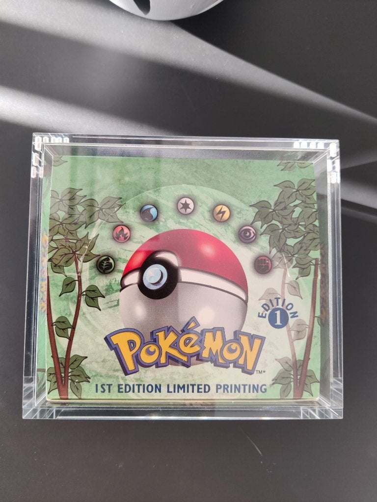 Jungle Booster Box 1st edition LEEG, Hobby en Vrije tijd, Verzamelkaartspellen | Pokémon, Ophalen of Verzenden, Zo goed als nieuw