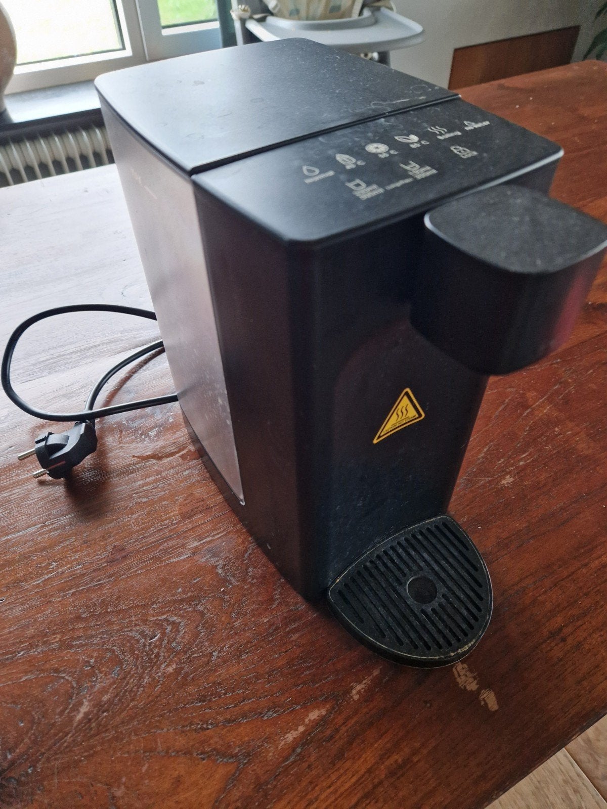 Waterdispenser met temperatuurregeling, Ophalen