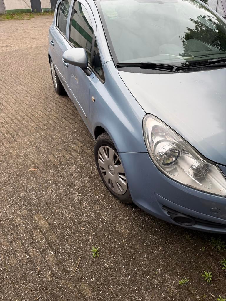 Opel Corsa 1.4 16V 5D 2007 Blauw, Auto's, Opel, Voorwielaandrijving, 1063 kg, 4 cilinders, Blauw