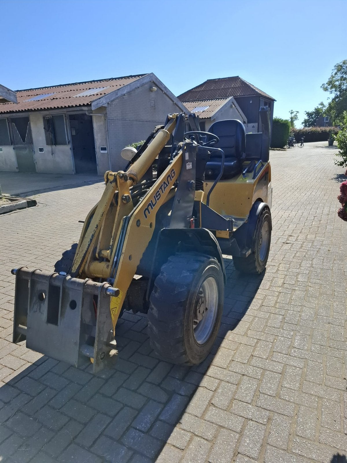 Mustang shovel, Ophalen, Wiellader of Shovel