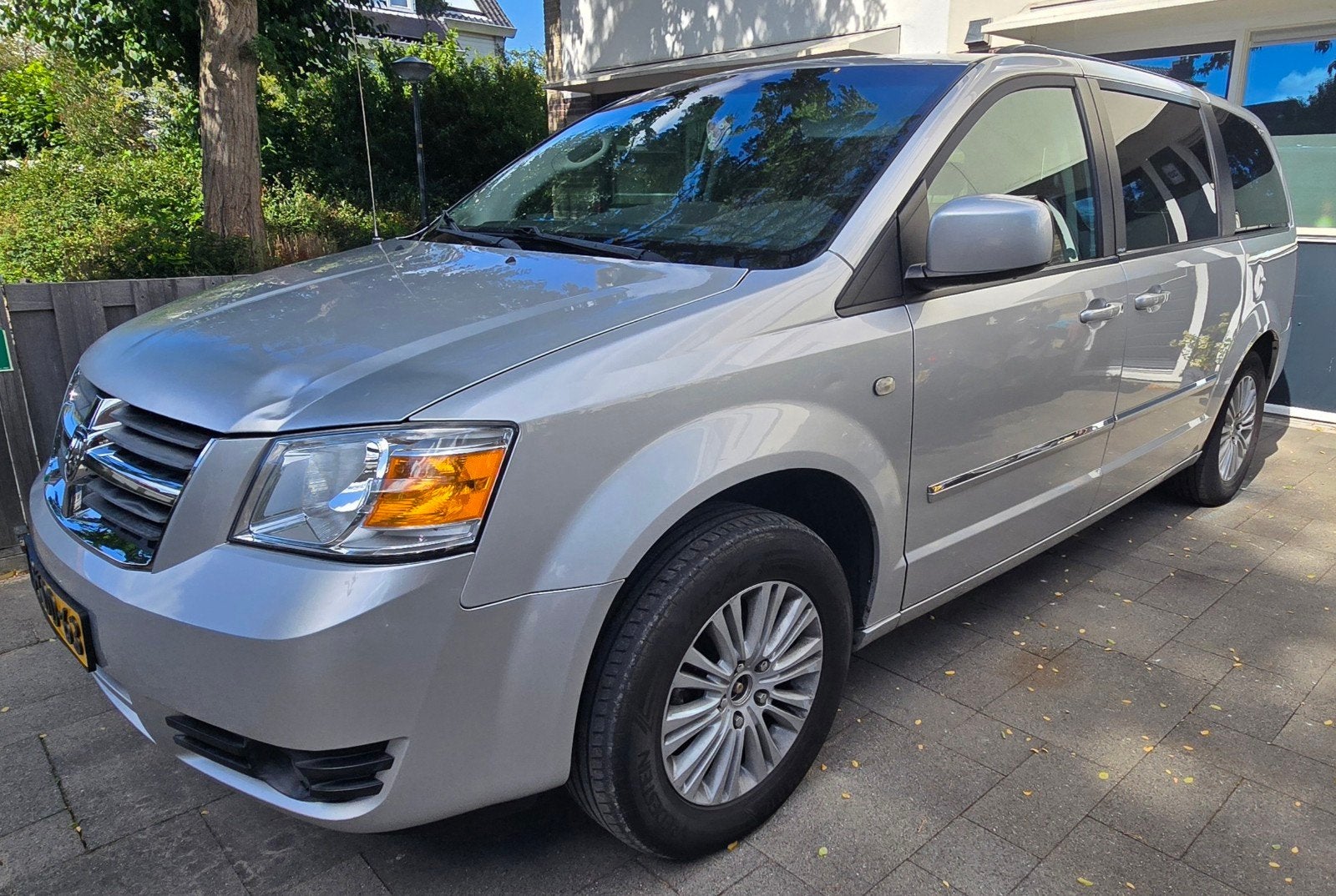 Dodge grand caravan 3,8 2009 Grijs, Auto's, 7 stoelen, Stationwagon, 193 pk, 2010 kg