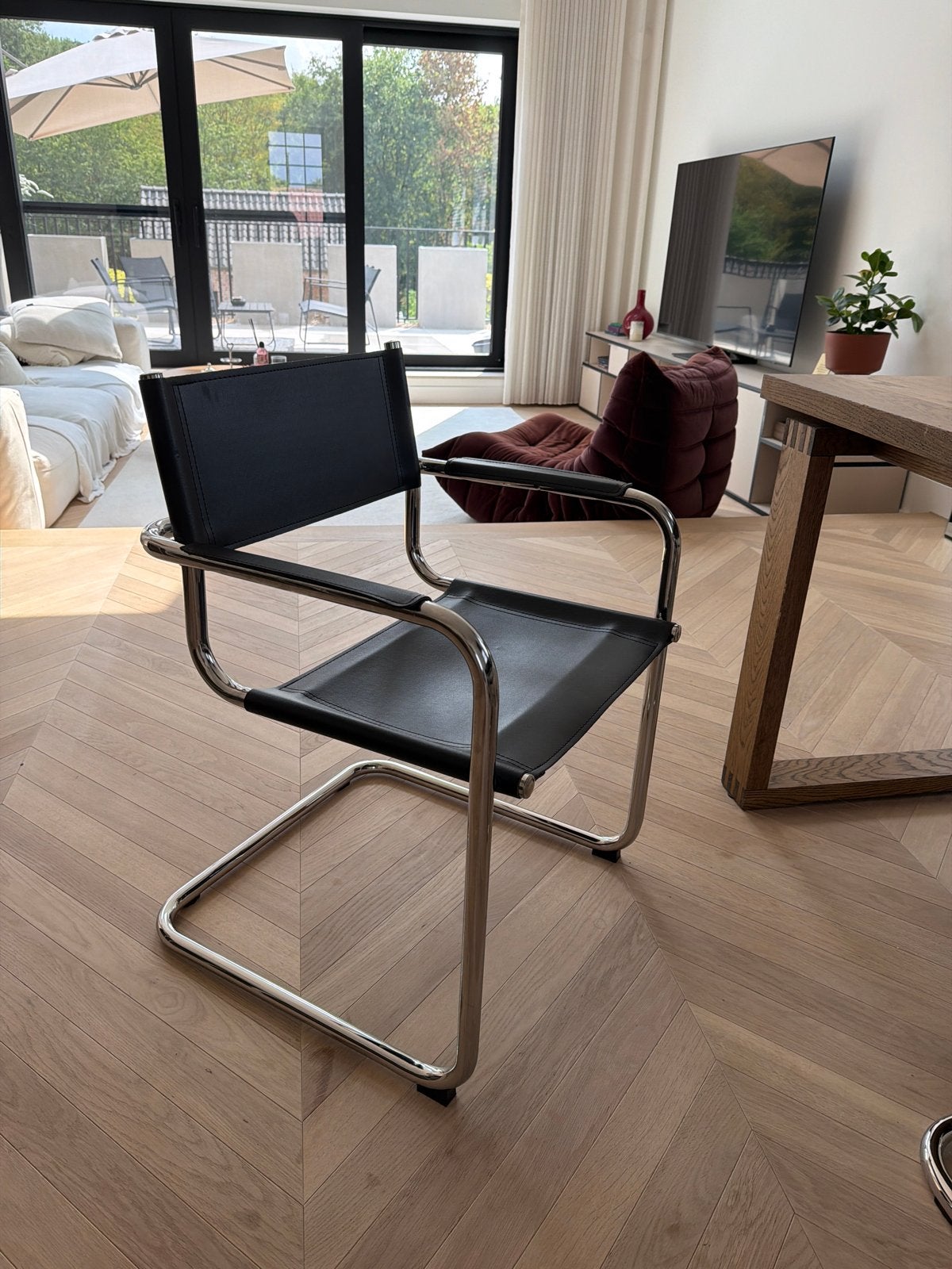 Zwarte lederen stoel met stalen frame, Huis en Inrichting, Stoelen, Ophalen, Gebruikt, Zwart, Leer