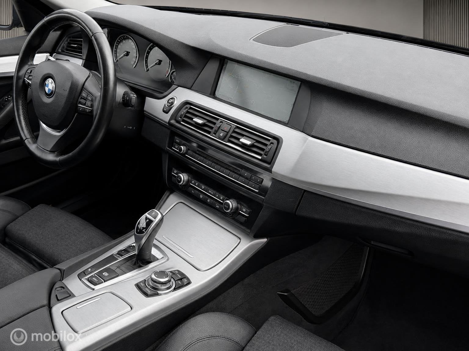 Foto 14 van BMW 5-serie Touring 520i High Executive