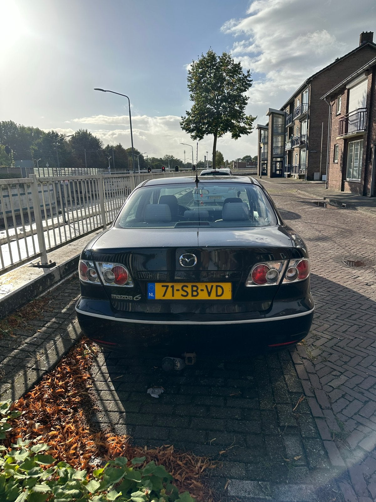 Mazda 6 2.0 SDN Touring 2005 Zwart, Auto's, 4 cilinders, Zwart, Origineel Nederlands, Handgeschakeld