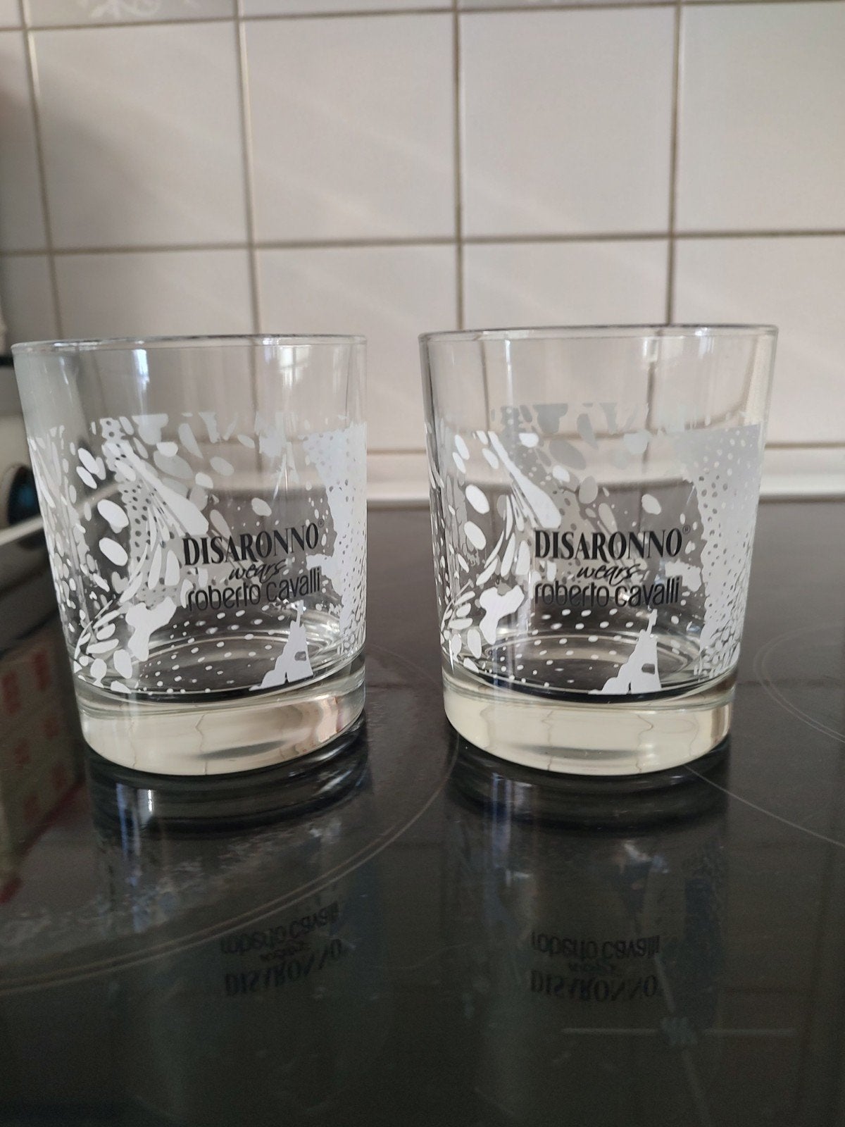 Disaronno Roberto Cavalli glazen (set van 2), Ophalen of Verzenden, Zo goed als nieuw, Meerkleurig, Overige merken