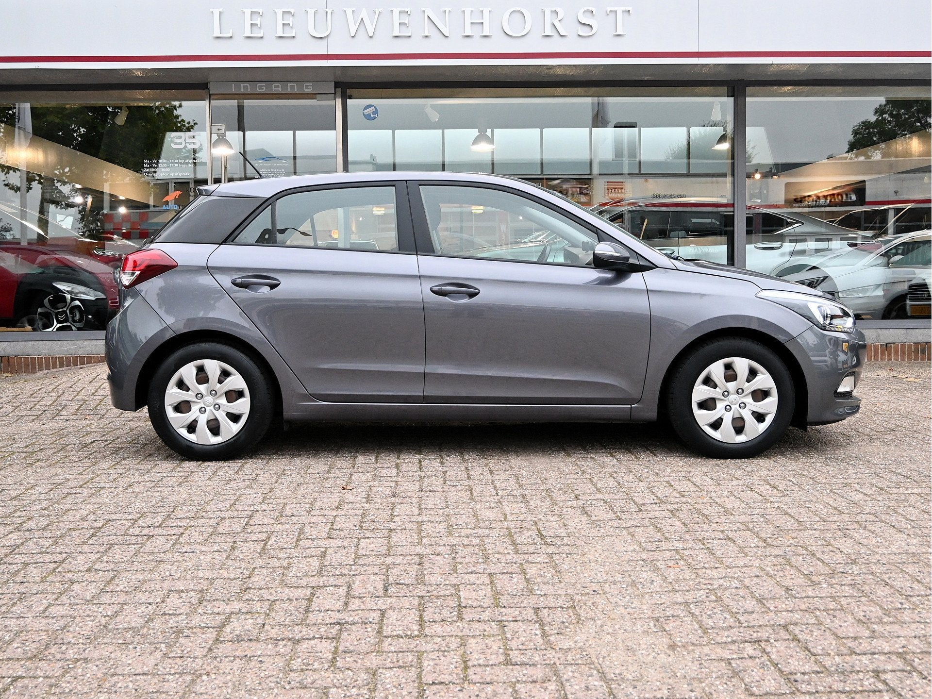 Hyundai i20 1.2 HP i-Motion NL-auto, trekhaak, cruise, bleut, Auto's, 83 pk, Euro 6, 4 cilinders, LED verlichting