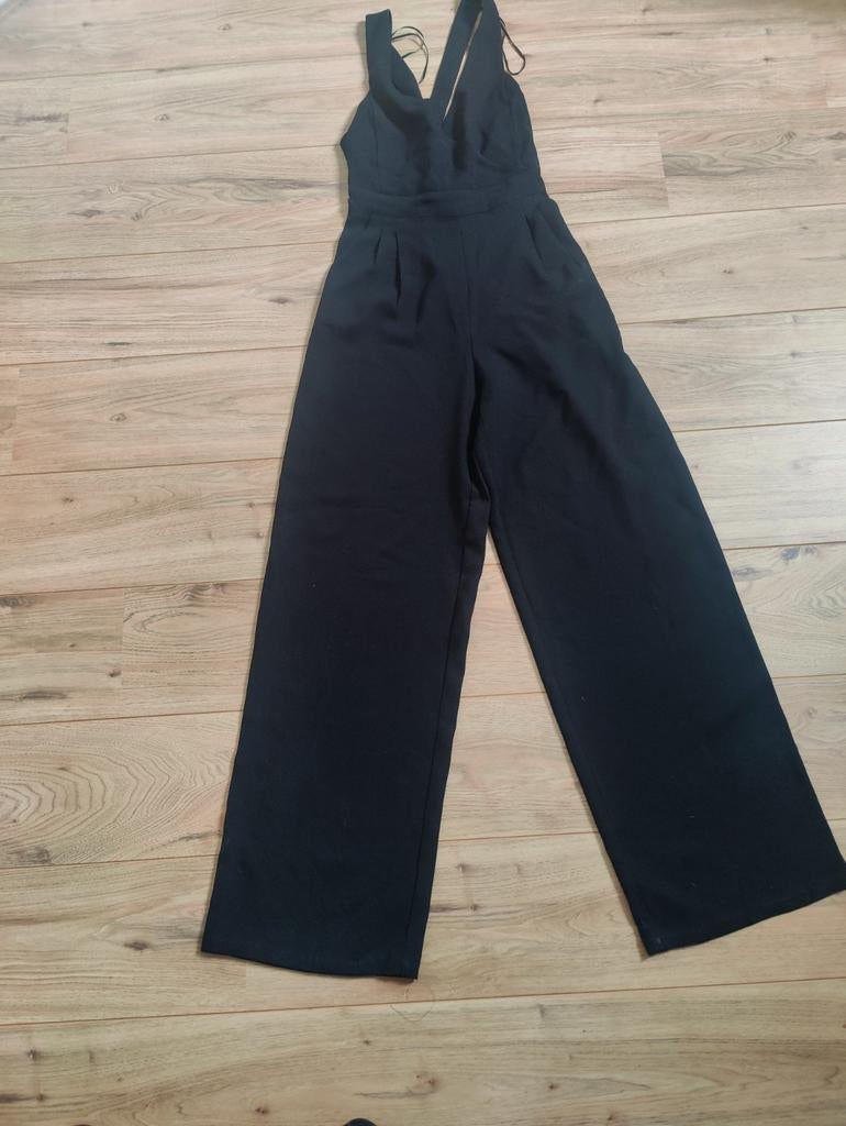 Zwarte jumpsuit met wijde pijpen - Pull&Bear, Kleding | Dames, Jumpsuits, Maat 38/40 (M), Pull&Bear, Zwart, Ophalen of Verzenden