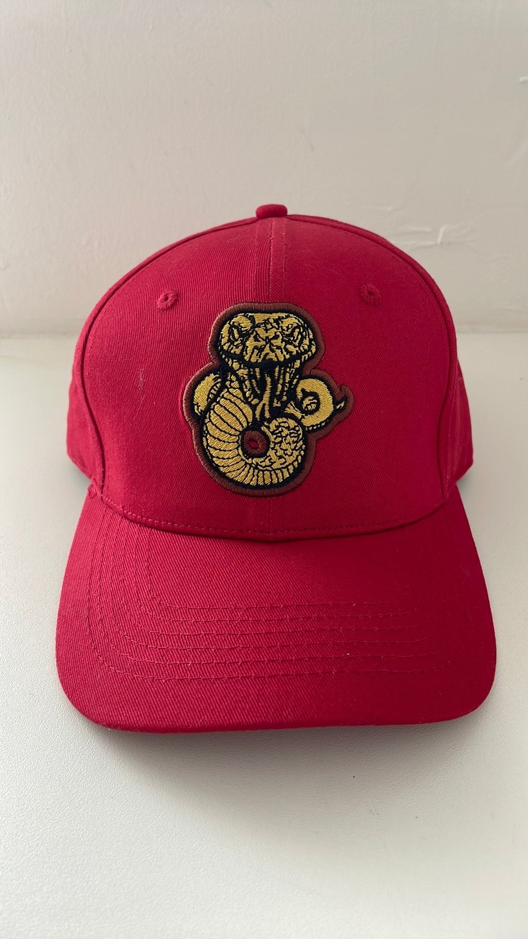 Efteling Python ‘original curved’ cap, Verzamelen, Efteling, Ophalen of Verzenden, Nieuw, Gebruiksvoorwerp