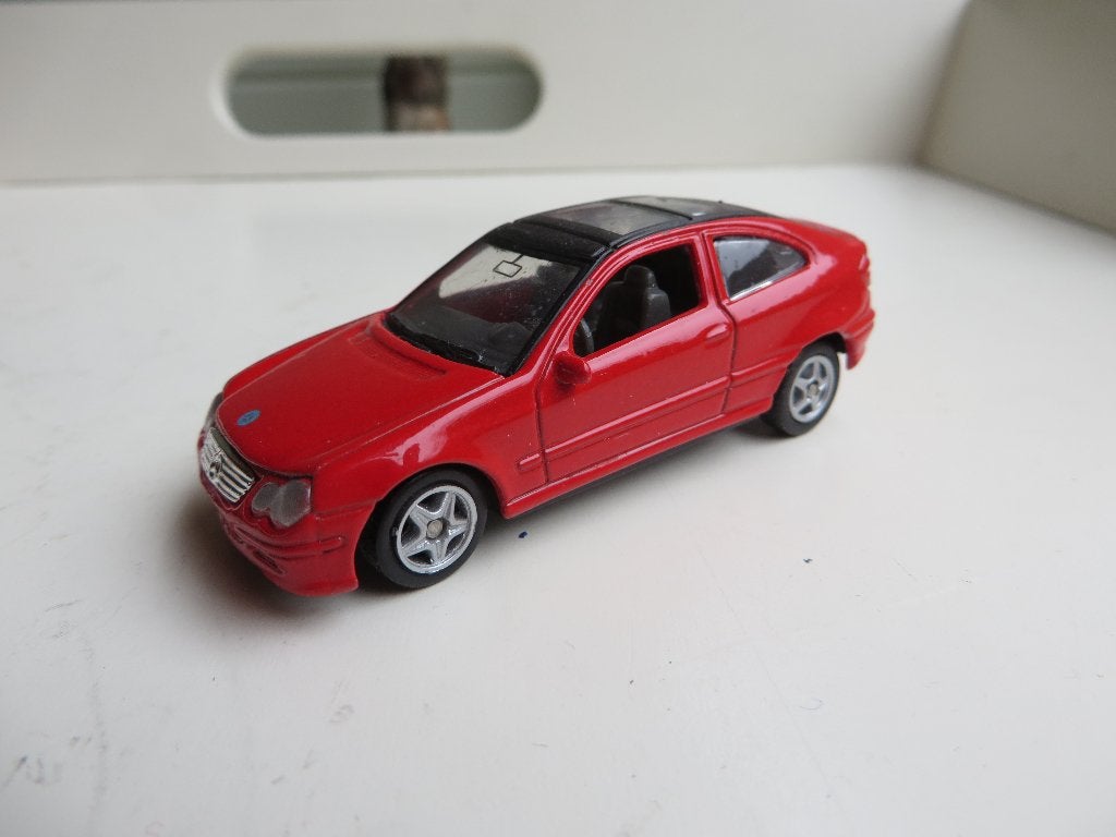 Welly Mercedes Benz C-Class sports coupé, Hobby en Vrije tijd, Modelauto's | Overige schalen, Ophalen of Verzenden, Gebruikt, Auto