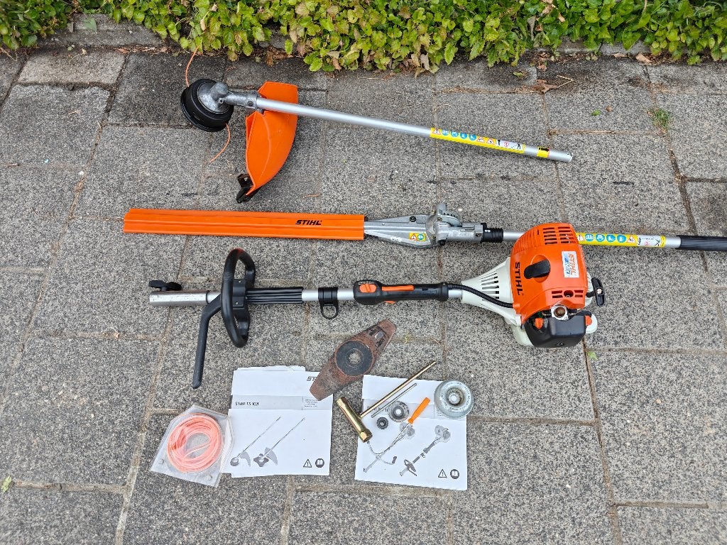Stihl combi motor KM100R met heggenschaar en bosmaaier, Tuin en Terras, Ophalen, Gebruikt, 30 tot 50 cm, Benzine