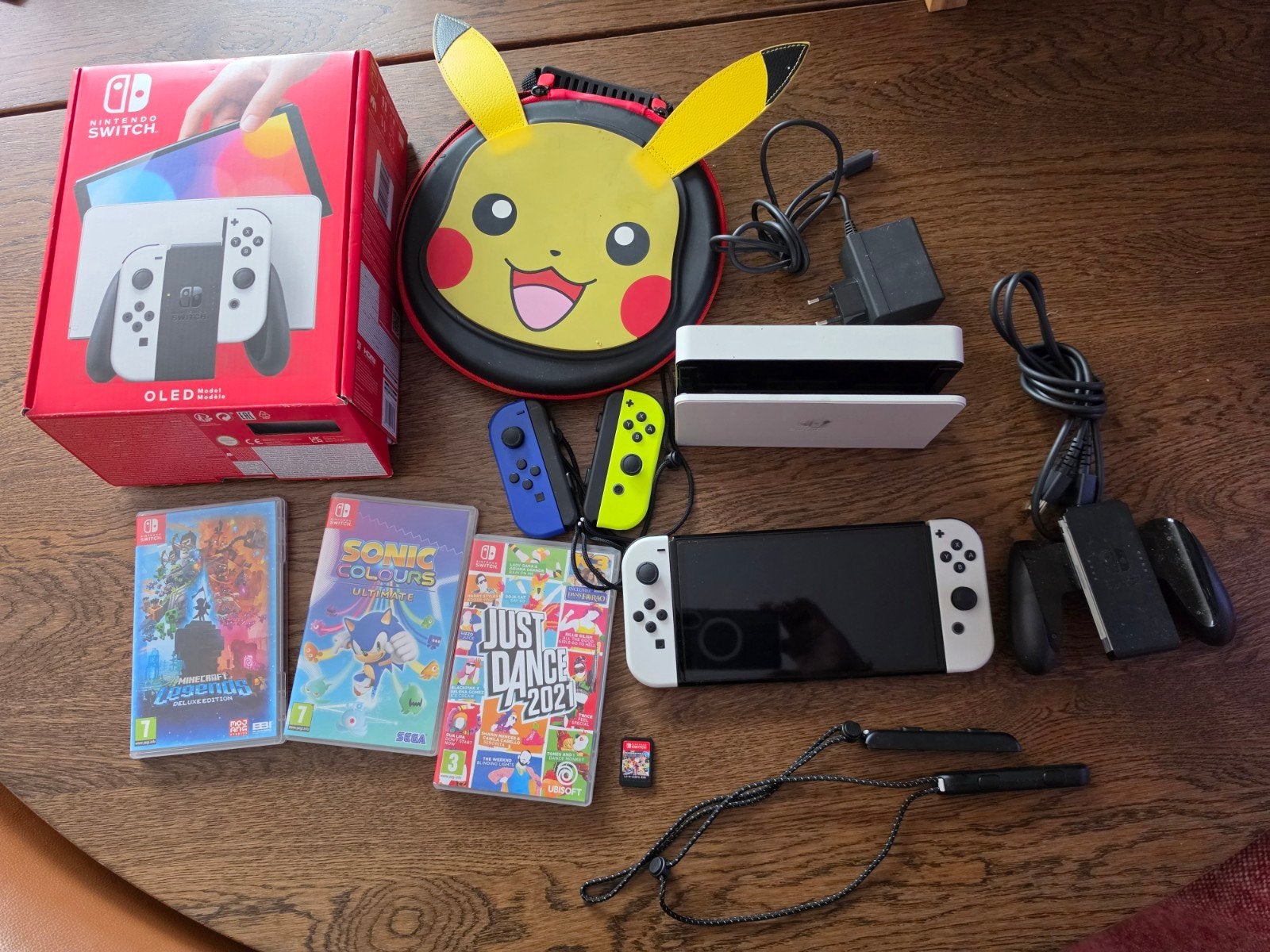 Nintendo switch oled met 4 spellen en extras, Ophalen of Verzenden, Zo goed als nieuw, Switch Original